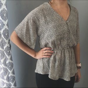 White and black blouse size medium